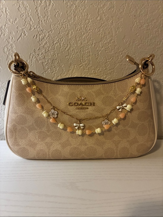 Coach Accessories - Peach & Cream Piakake and Hawaiian Crown flower Purse Chain